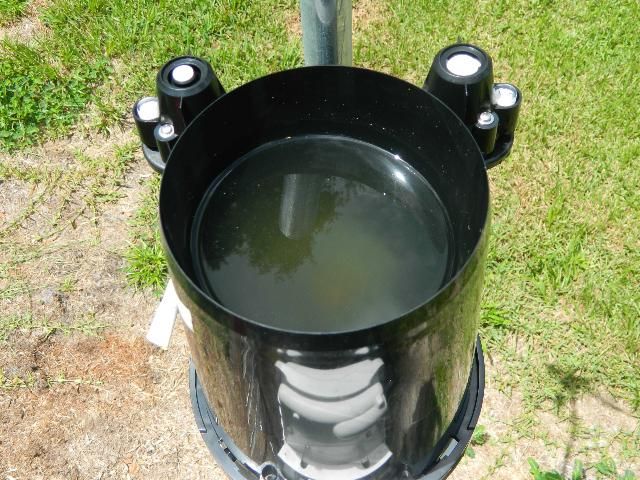 Figure 3. Most common problem found in rain gauges is clogging of the catchment funnel by insects, turf clippings, and dirt. Check weekly or more often if necessary.