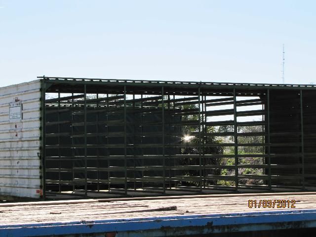 Figure 23. Inside view of trailer used for delivery of transplants showing T-rail system