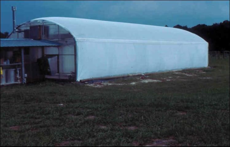 Figure 26. Greenhouse with woven shade cover.