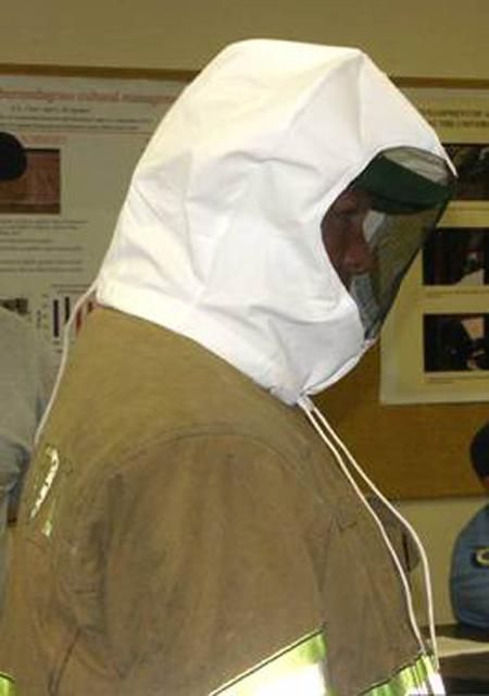 Figure 9. First responder wearing a convenient, lightweight, and portable veil that can be folded to the size of a wallet.