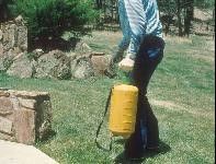 Figure 4. A hand-pump sprayer is commonly used to deliver pesticide diluted in water around lawn and garden.