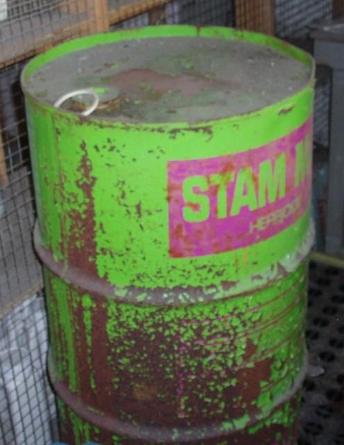 Figure 5. Moisture can cause pesticide storage containers made of metal to rust.