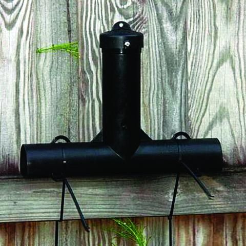 Figure 9. Inverted T bait station secured to a fence stringer board with locking cables.