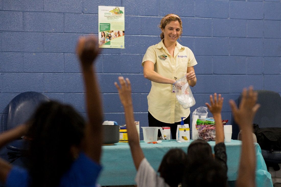 Figure 21 These children are communicating to the teacher without saying anything.