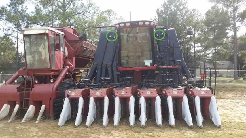 Figure 7. Location of optical sensor housing cut into the pneumatic ducts on a Case IH cotton picker (circled in green).