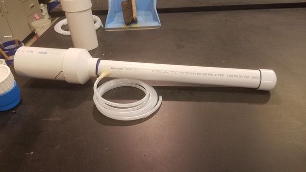 Assembled drainage lysimeter with collection chamber, reducer, reservoir, and purge tube shown.