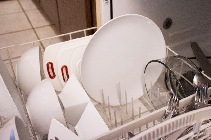 Dishes in a dishwasher. 