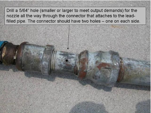 The nozzle for herbicide discharge can be drilled to any appropriate size. Note that the leading edges of the fitting are ground down to minimize snagging on submersed weeds.