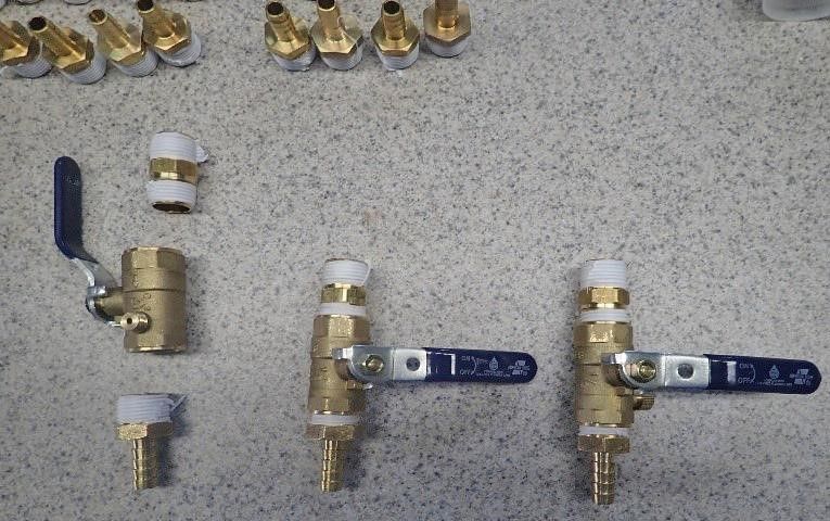 Assembling 1/2-inch brass male adapter, 1/2-inch brass ball valve, and brass barb with 3/8–1/2-inch capacity.
