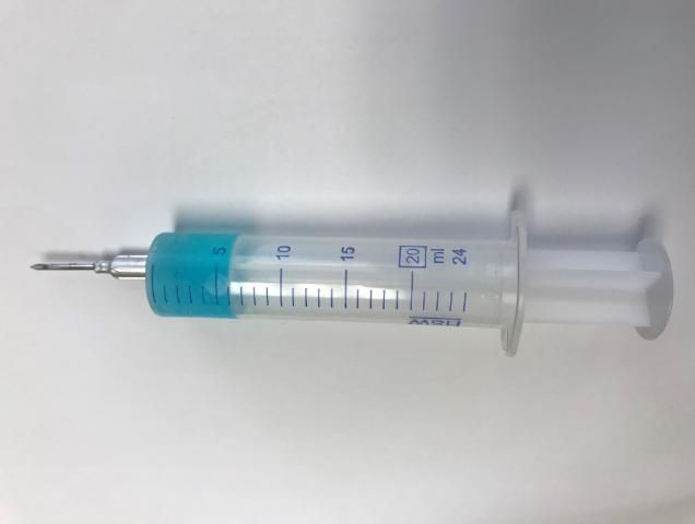 Figure 2. Injectable trace mineral solution in a syringe, dose for a 1,200 lb mature cow.