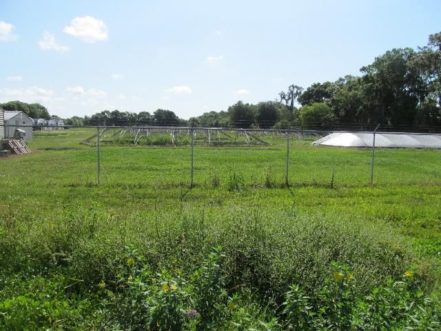 Figure 11. Security fencing used at a Florida aquaculture facility to restrict public access.