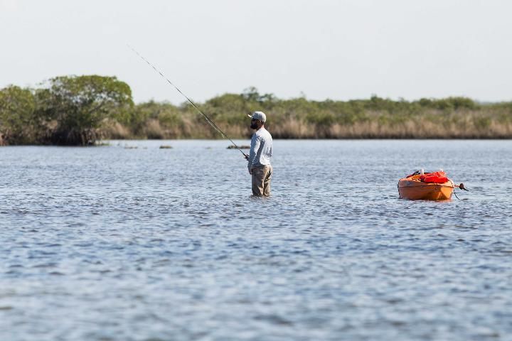 Figure 4. A fisherman in shallow waters in the Gulf of Mexico.