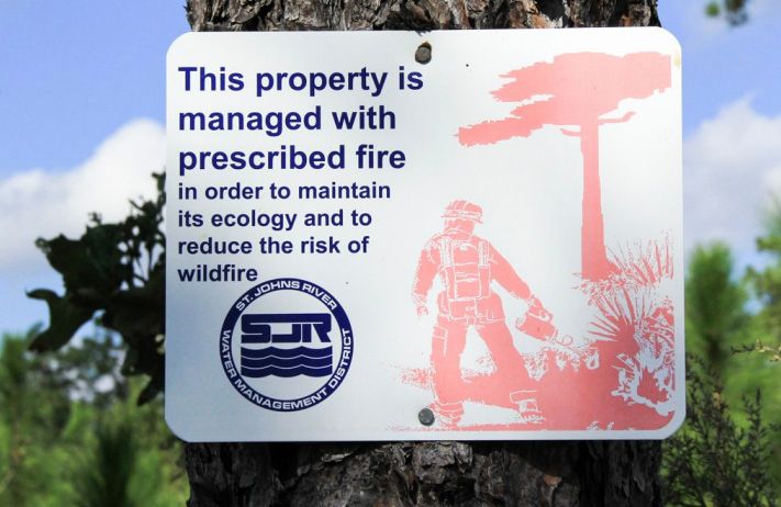 Signs that explain why prescribed fire is being used to manage an ecosystem can help educate neighbors. 