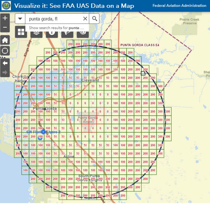 FAA UAS data map over Punta Gorda, Florida, with altitude restriction grid. The map is overlaid with a grid of small squares, each labeled with numbers indicating altitude restrictions in feet. The grid is centered around the Punta Gorda Airport, marked with "0" in red blocks, increasing outward to "200" in green blocks. The geographic area extends to regions like Charlotte Harbor and Cleveland, Florida. Various shaded paths and text labels mark roads and key locations. The interface includes a search bar and control buttons for map manipulation on the left side.