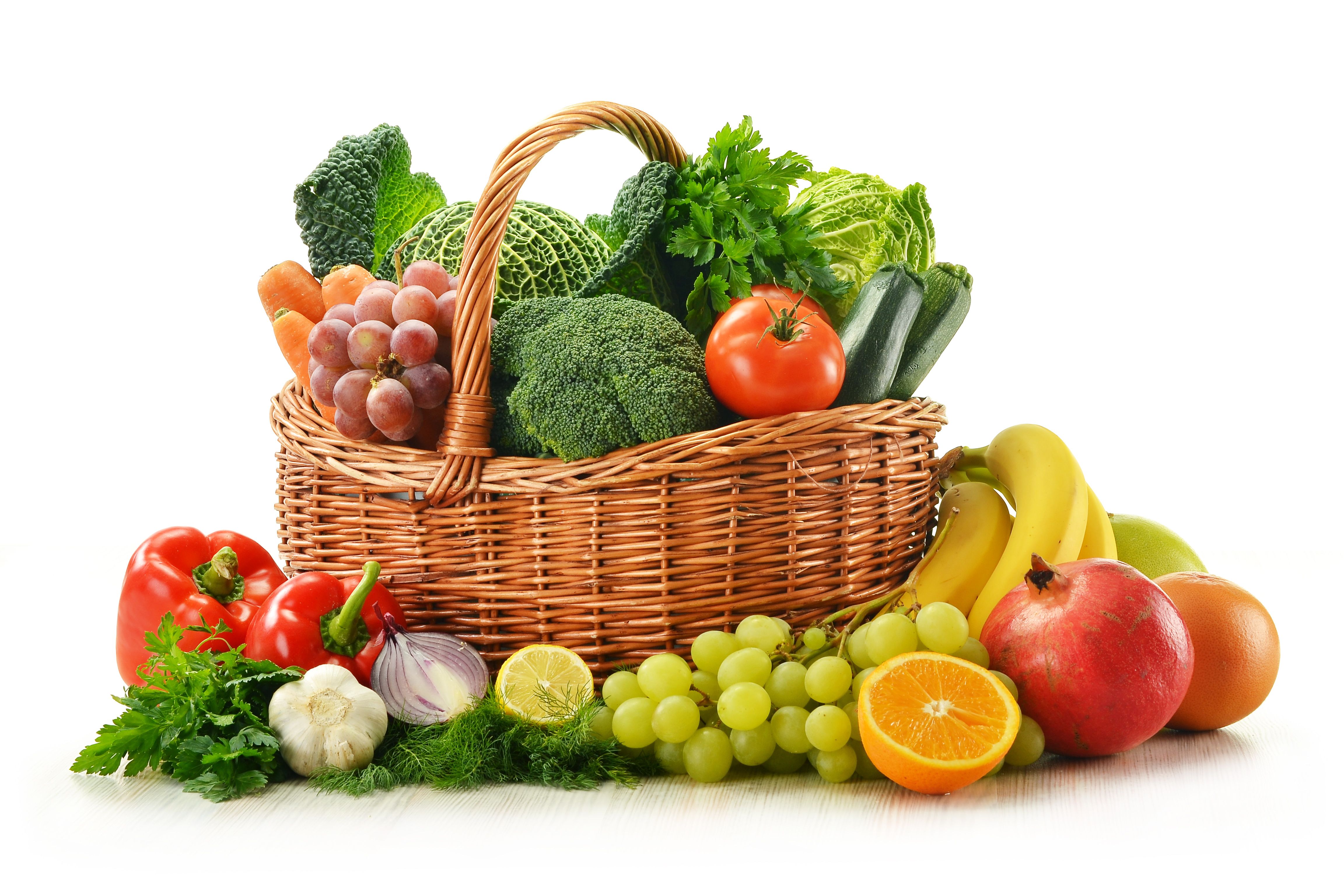 A basket filled with healthy food options, such as fresh fruits and vegetables.