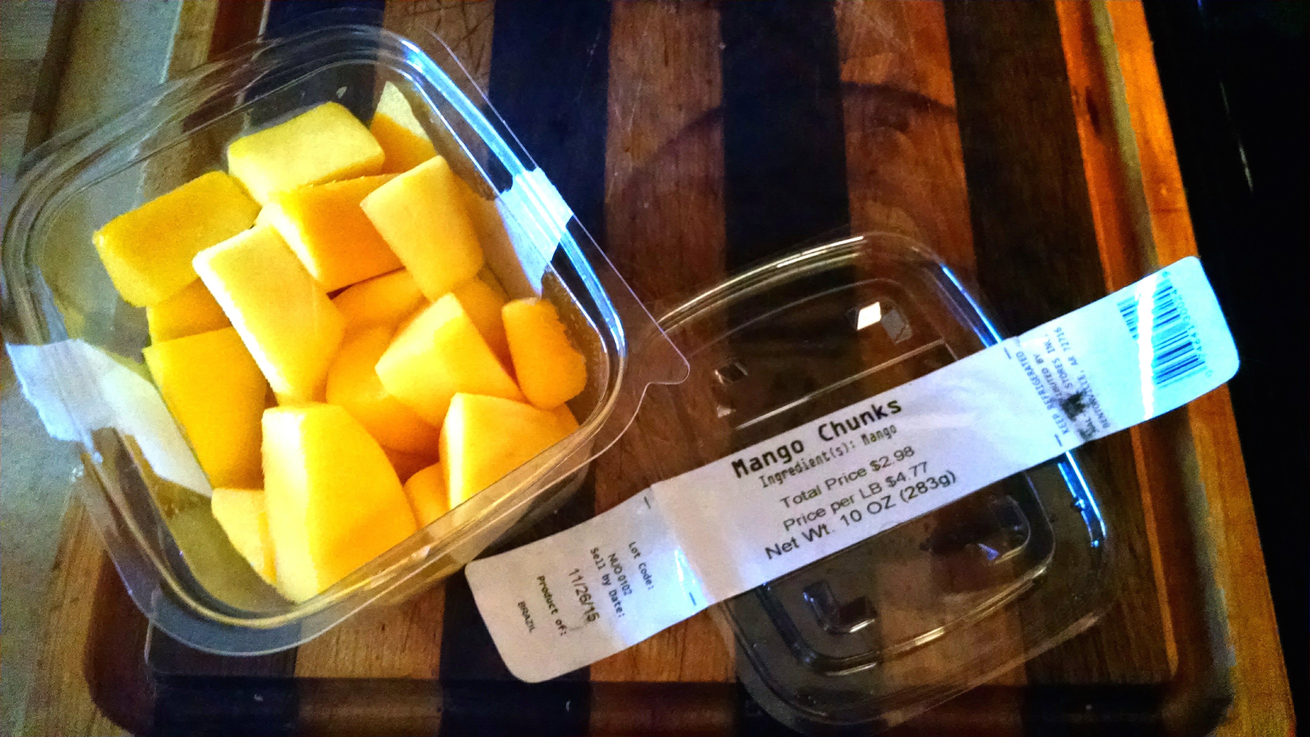Labels on fresh-cut mango packages showing traceback information. 
