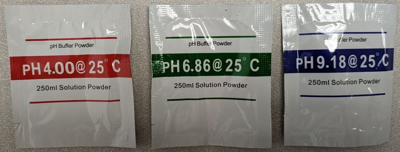 A white packet with green and red text

Description automatically generated