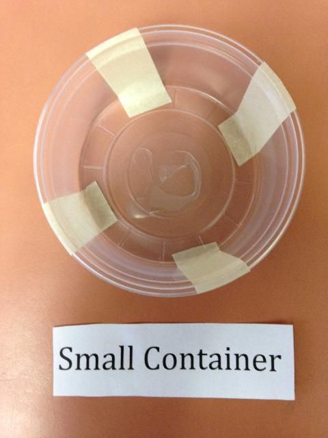 Figure 3. Rough-surfaced tape placed into the small container.