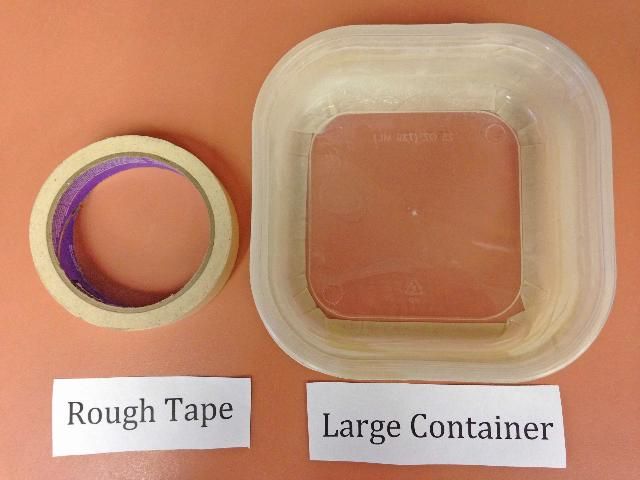 Figure 4. Rough-surfaced tape and a large container are needed for step #3.