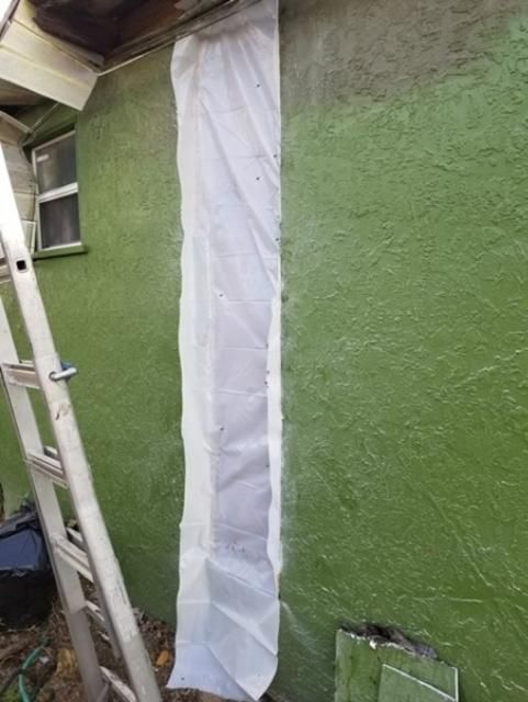 Figure 14. Unless you are a licensed and insured contractor, you should not attempt to repair a structure yourself. Flexible plastic sheeting can be used to provide a temporary seal.