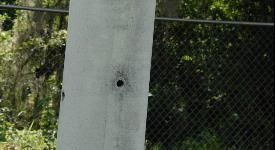 Small hole in power pole.