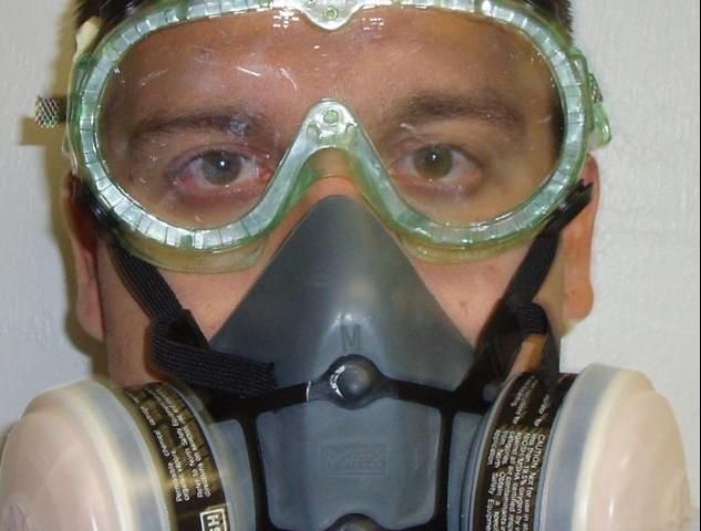 Figure 23. Wearing goggles with a half-face respirator.