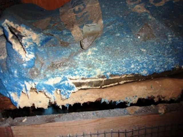 Figure 6. Moisture can cause pesticide storage containers made of paper to split.