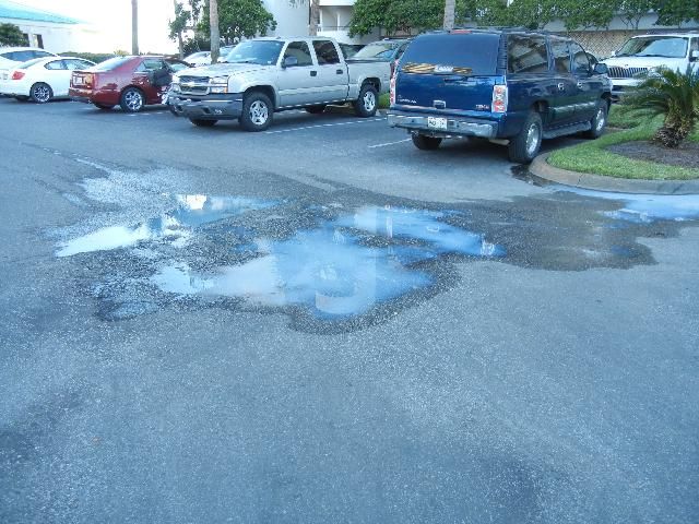 Figure 3. A small spill in a parking lot should be cleaned up immediately.