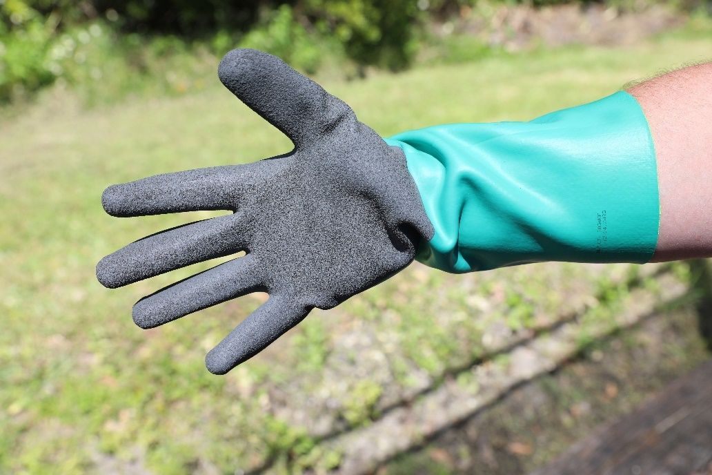 Nitrile gloves with textured grip.