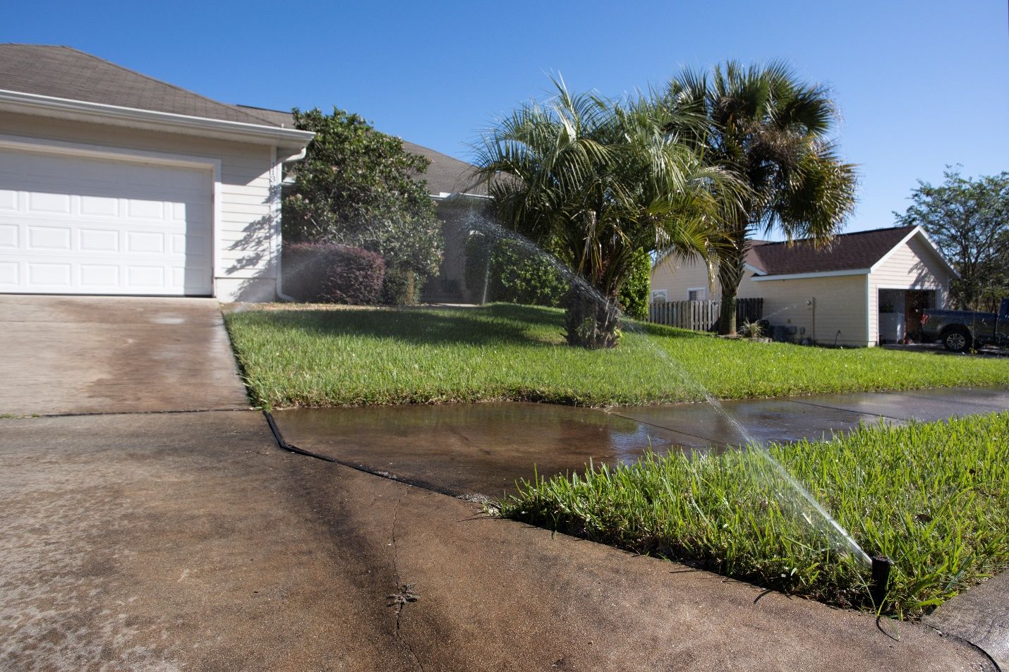 Reclaimed water used for irrigation may contain elevated levels of nutrients. Be sure to adjust sprinkler systems and only water vegetation, not sidewalks and streets. Images like this one not only represent wasteful use of water but also demonstrate how nutrients from reclaimed water irrigation could be mobilized to the environment in urban landscapes.  
