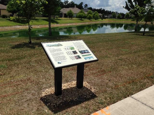 Figure 2. We installed this sign in a Gainesville, FL development. We chose a spot near a sidewalk where people traffic is high. The panel discusses water-wise landscaping.